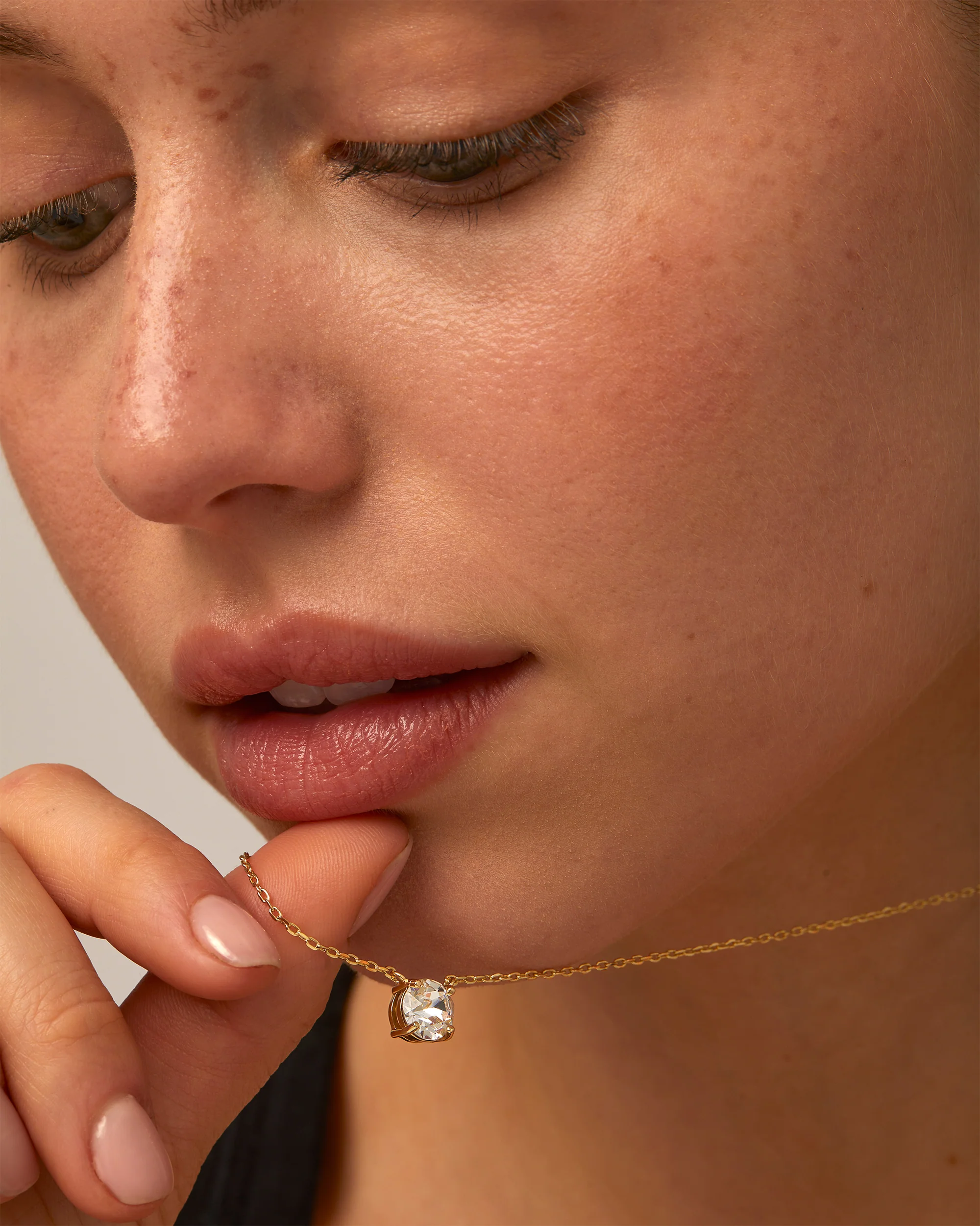 Model wearing DNA pendant